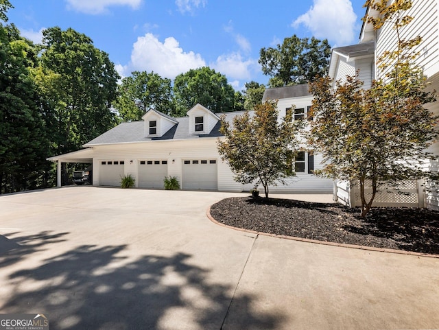 cape cod home with a carport