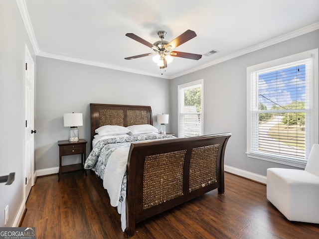 bedroom with dark wood-style floors, visible vents, and baseboards