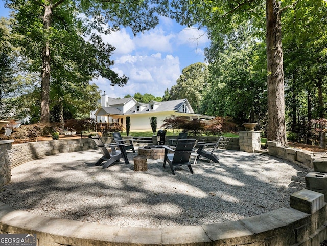 view of patio / terrace featuring a fire pit