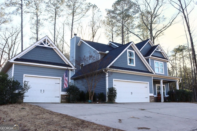 craftsman-style home with a garage