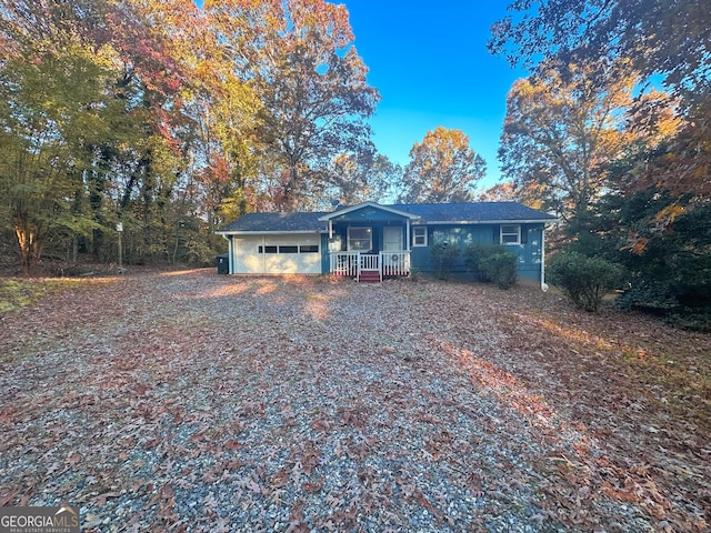 ranch-style home with a porch