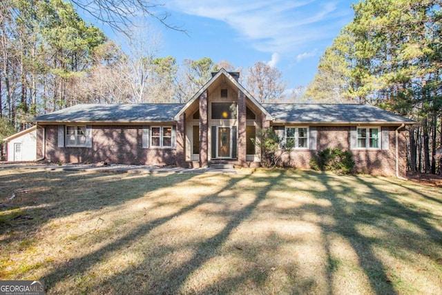 view of front of property with a front lawn