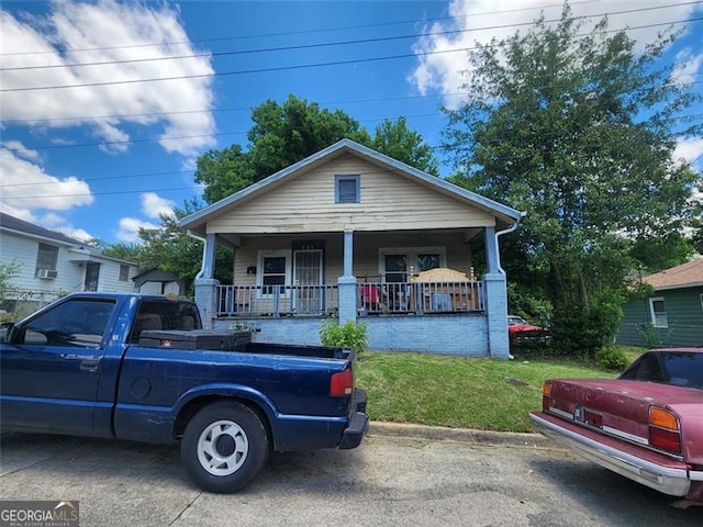 bungalow-style home with covered porch