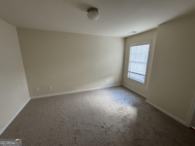 view of carpeted spare room