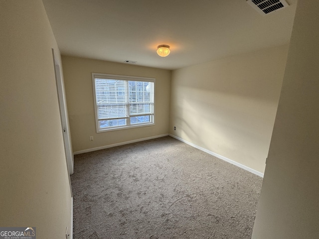 spare room with carpet