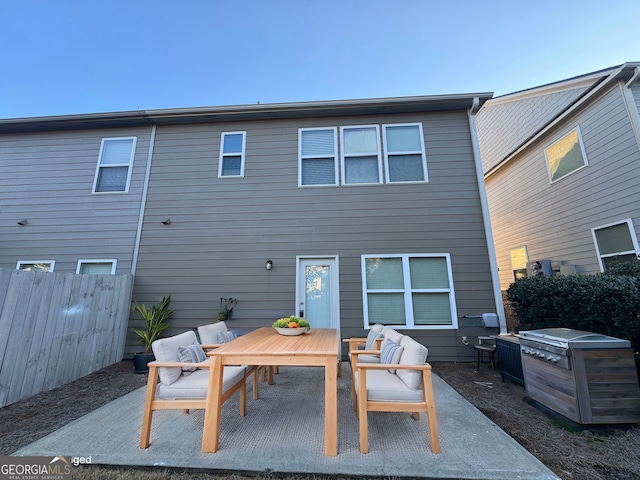 rear view of property with a patio