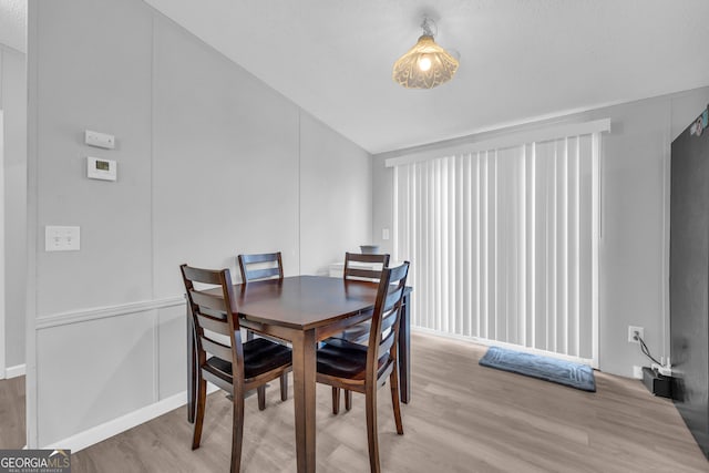 dining area with light wood-type flooring