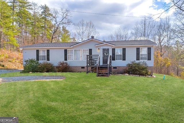 ranch-style house with a front lawn