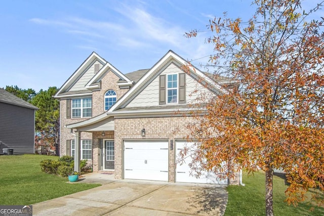 view of front of home featuring a front lawn and a garage