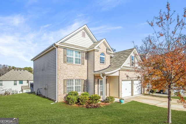 view of front of house featuring a front yard and a garage