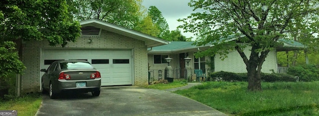 ranch-style house with a garage