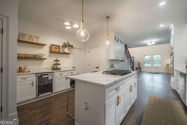 kitchen with dark wood-type flooring, a kitchen breakfast bar, wine cooler, light stone counters, and white cabinets