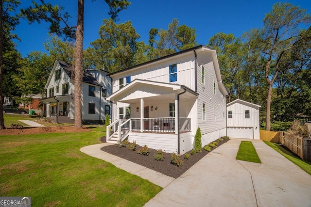 view of front of home with covered porch and a front lawn