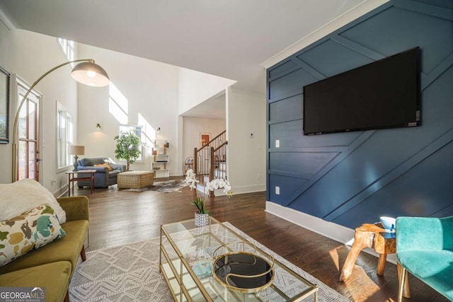 living room with dark hardwood / wood-style flooring