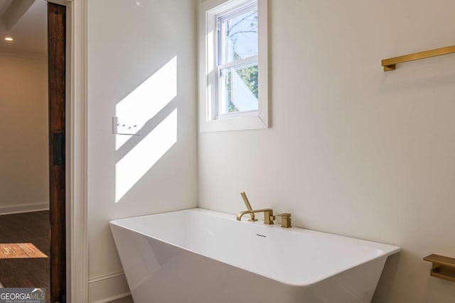 bathroom with a bathing tub