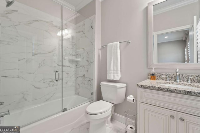 full bathroom featuring toilet, vanity, bath / shower combo with glass door, and ornamental molding