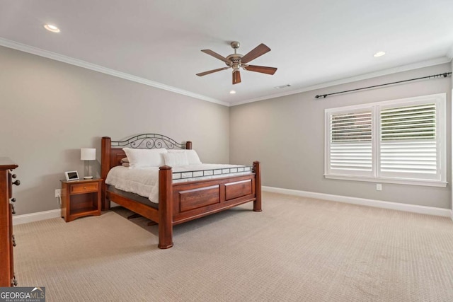 carpeted bedroom featuring ceiling fan and ornamental molding