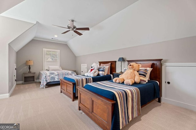 carpeted bedroom featuring ceiling fan and vaulted ceiling