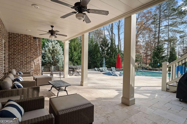 view of patio / terrace with outdoor lounge area and ceiling fan