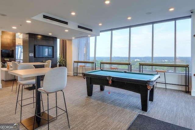 recreation room featuring a water view and billiards