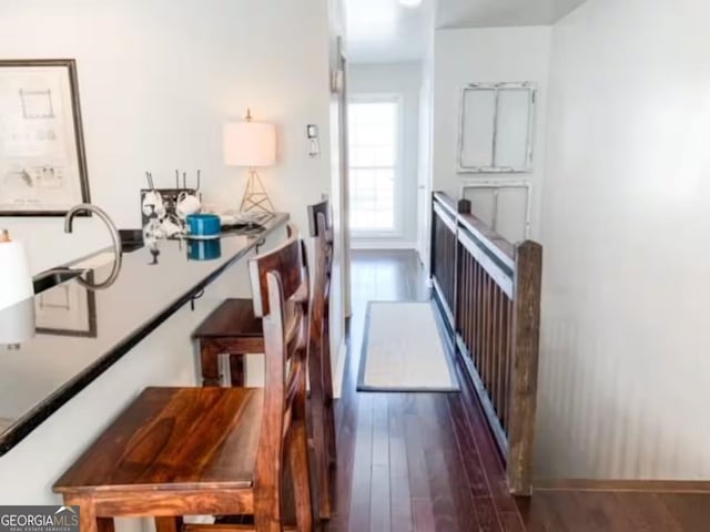 interior space with dark hardwood / wood-style flooring