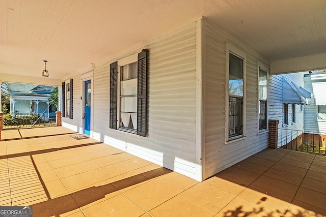 view of home's exterior featuring covered porch