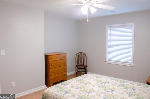 bedroom featuring ceiling fan and light hardwood / wood-style floors