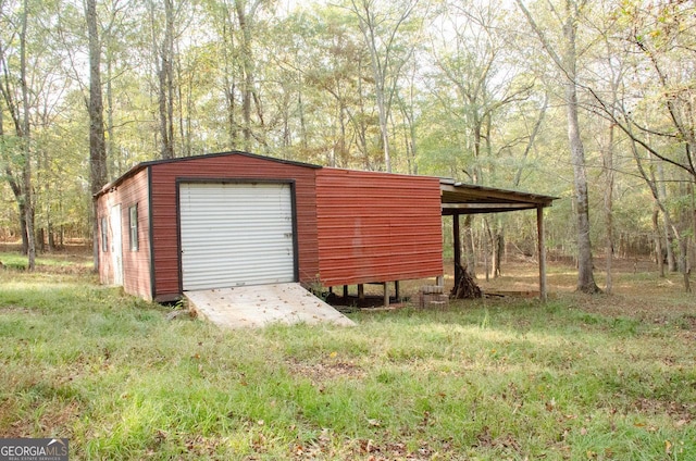 view of outdoor structure with a garage