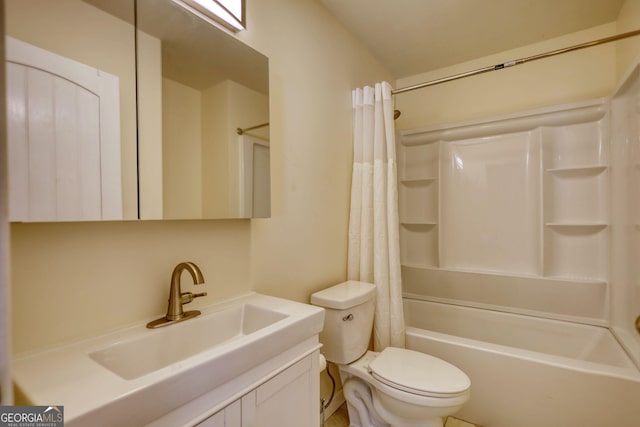 full bath with toilet, shower / bath combo, and vanity