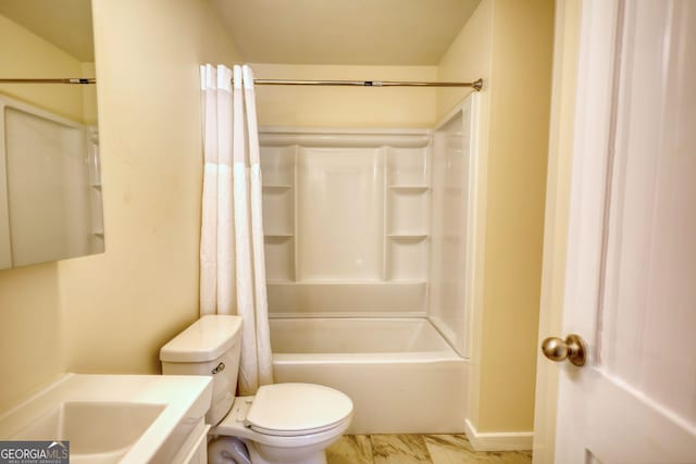 full bathroom with toilet, shower / tub combo, marble finish floor, and vanity