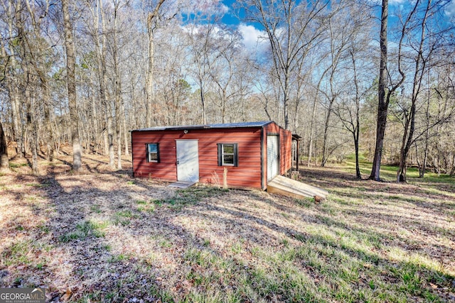 view of outbuilding with an outbuilding