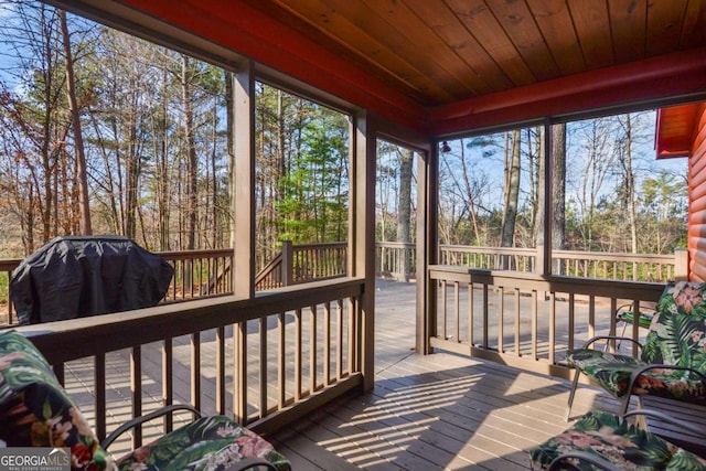 sunroom with wood ceiling