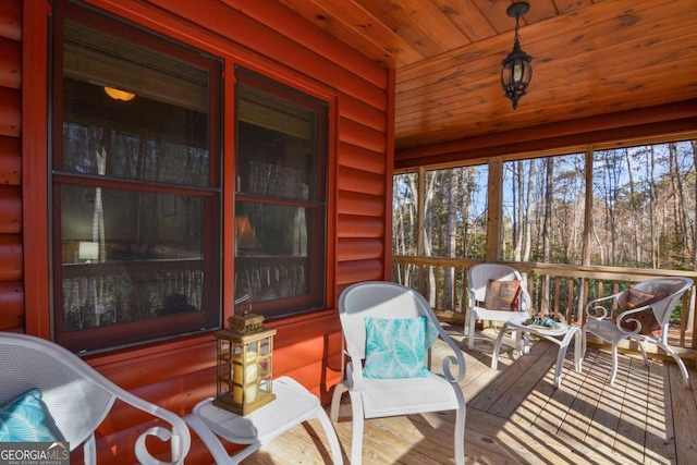 sunroom with wooden ceiling