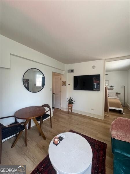 living room featuring hardwood / wood-style floors