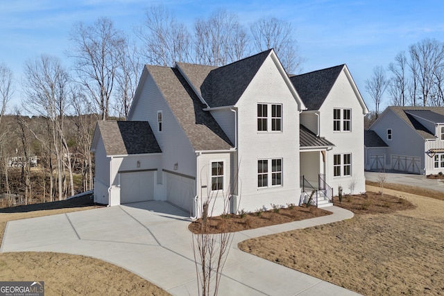 view of front of property featuring a garage