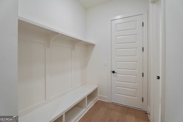 mudroom with light hardwood / wood-style flooring