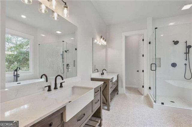 bathroom with vanity and walk in shower