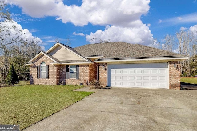 ranch-style house featuring a garage and a front lawn