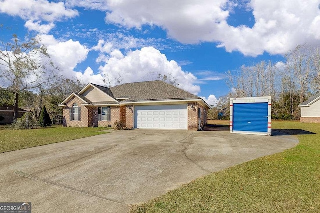 view of front facade featuring a garage and a front lawn