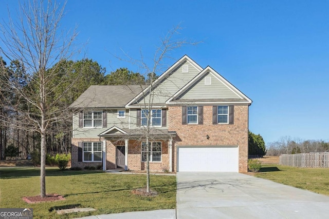 view of front facade with a front yard and a garage