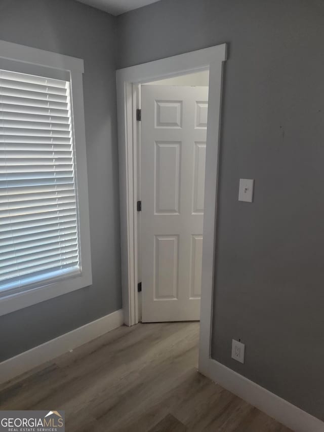 hall featuring light hardwood / wood-style floors