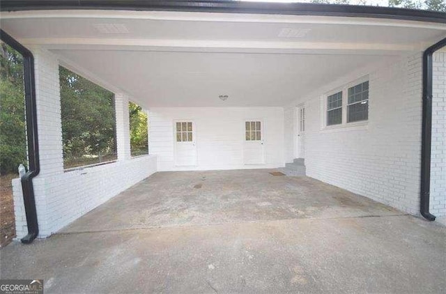 view of patio / terrace with a carport