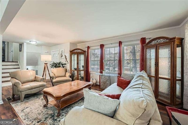 living room featuring crown molding and dark hardwood / wood-style floors