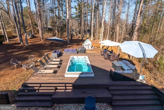 view of swimming pool featuring an outdoor living space, a deck, and area for grilling