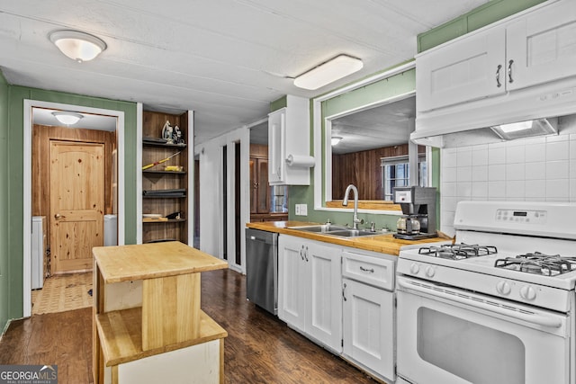 kitchen with white cabinets, sink, stainless steel dishwasher, butcher block countertops, and white range with gas cooktop