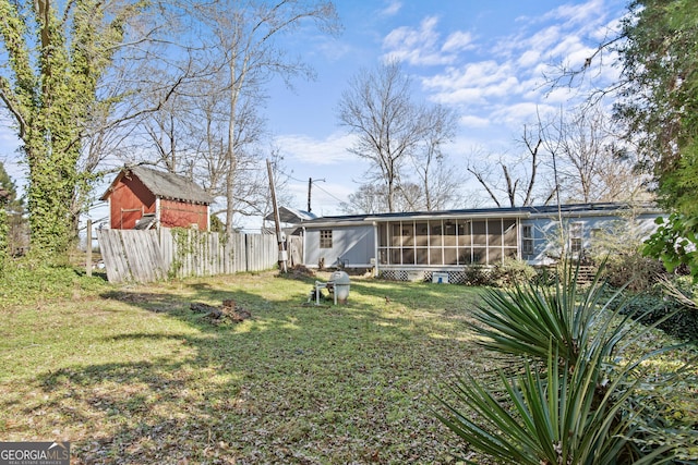 view of yard with a sunroom