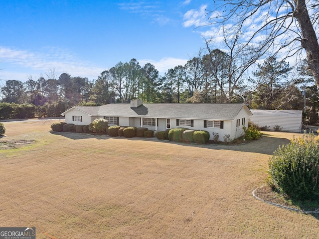 ranch-style house with a front yard