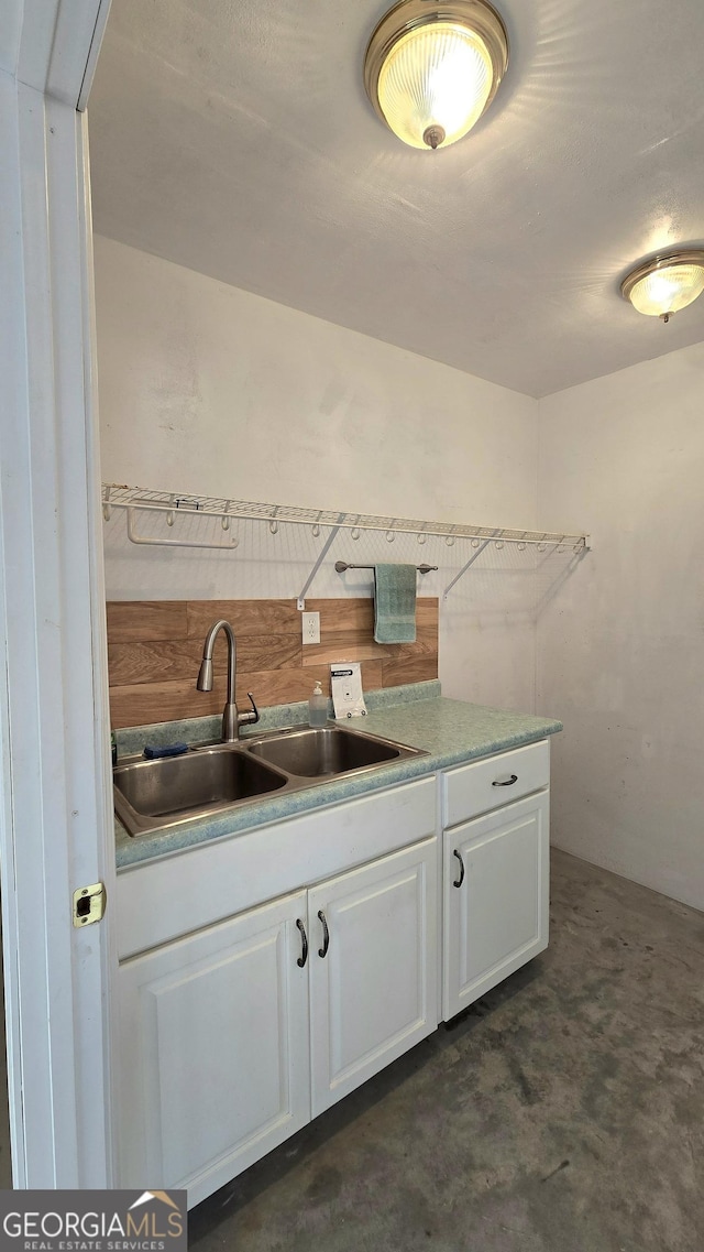 kitchen with white cabinets and sink