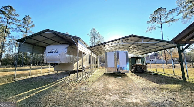 exterior space with a carport