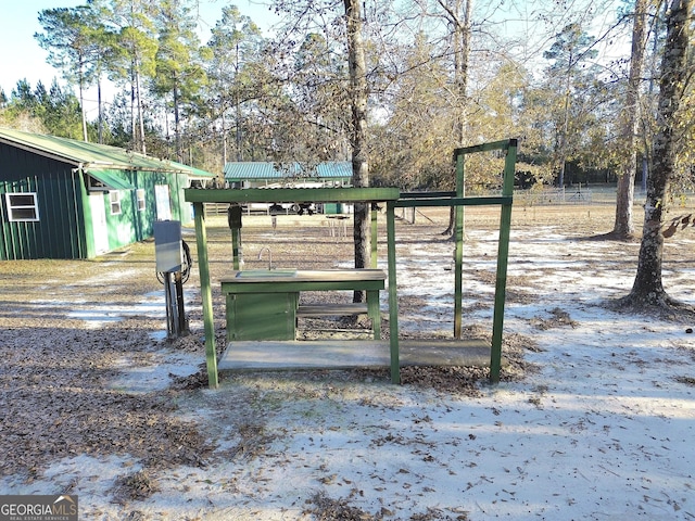 view of community featuring an outbuilding